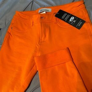 Orange stretch pants